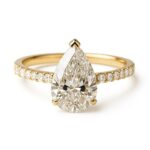 Women's engagement ring with a pear-shaped center stone